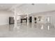 Bright open-concept living room showcases marble floors and leads to the modern kitchen at 3826 Edmond St, Las Vegas, NV 89103