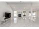 Open-concept living space with marble flooring, fireplace, and ample natural light at 3826 Edmond St, Las Vegas, NV 89103