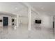 Expansive open-concept living area boasting modern marble floors, contemporary decor, and lots of space at 3826 Edmond St, Las Vegas, NV 89103