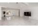 Spacious living area boasts pristine white marble floors, offering a clean and modern design at 3826 Edmond St, Las Vegas, NV 89103