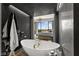 This primary bath features a soaking tub with a view of the main bedroom, and modern finishes at 387 Solitude Peak Ln, Henderson, NV 89012
