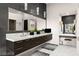 This primary bath includes dual sinks, a make up vanity, and a spacious countertop at 387 Solitude Peak Ln, Henderson, NV 89012