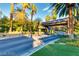 Gated entrance with lush landscaping creates a welcoming and secure atmosphere for a prestigious community at 387 Solitude Peak Ln, Henderson, NV 89012