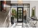 Stylish home entrance with contemporary decor, featuring a statement mirror and modern console table, creating an inviting space at 387 Solitude Peak Ln, Henderson, NV 89012