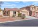Charming single-story home featuring a desert-landscaped front yard and a two-car garage, perfect for comfortable living at 4043 Lilac Creek Ct, Las Vegas, NV 89122