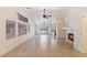 Spacious living room with vaulted ceiling, fireplace, and tiled floors offers an open space at 4043 Lilac Creek Ct, Las Vegas, NV 89122