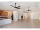 Open concept living space seamlessly connects living room and kitchen for modern living at 4043 Lilac Creek Ct, Las Vegas, NV 89122