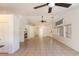Open living area with tiled floors, recessed lighting, vaulted ceiling and cozy fireplace at 4043 Lilac Creek Ct, Las Vegas, NV 89122