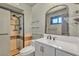 Bathroom featuring a shower and a large decorative mirror at 4272 Sheppard Dr, Las Vegas, NV 89121