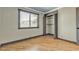 Bedroom with wood flooring, closet and natural light from window at 4272 Sheppard Dr, Las Vegas, NV 89121