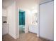 The space includes a modern vanity and a full bathroom with stylish blue tile at 4600 University Center Dr # 72, Las Vegas, NV 89119