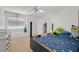 Bright bedroom with comfortable carpet, a window seat, and ample storage at 50 Desert Castle Ct, Henderson, NV 89012