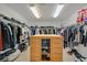 Organized walk-in closet with custom shelving and ample storage space at 50 Desert Castle Ct, Henderson, NV 89012