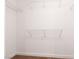 A walk-in closet with neutral carpet and white wire shelving for organization at 5049 Running Rapids Ave, Las Vegas, NV 89130
