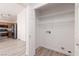 A convenient laundry room closet with built-in wire shelving for easy storage at 5049 Running Rapids Ave, Las Vegas, NV 89130