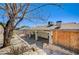 The back of the home features a covered patio and backyard shed at 5121 Gains Mill St, Las Vegas, NV 89122