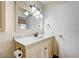 Bathroom featuring white vanity with marble countertop and stylish lighting at 5121 Gains Mill St, Las Vegas, NV 89122