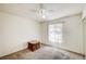 Neutral bedroom featuring carpet, ceiling fan, window with blinds and a wood chest at 5121 Gains Mill St, Las Vegas, NV 89122