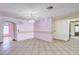 Open concept dining room featuring tile flooring and neutral color scheme at 5121 Gains Mill St, Las Vegas, NV 89122