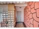 The home's secured front entry has a decorative door and stone accents at 5121 Gains Mill St, Las Vegas, NV 89122