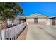 Charming single-story home featuring a well-maintained front yard and a long, spacious driveway at 5121 Gains Mill St, Las Vegas, NV 89122