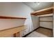 Ample storage room with wooden shelves and tile flooring, perfect for organizing belongings and household items at 5121 Gains Mill St, Las Vegas, NV 89122