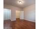 Bedroom with laminate flooring, closet and walk-in closet at 5415 W Harmon Ave # 1162, Las Vegas, NV 89103