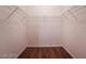 Walk-in closet featuring laminate floors and wire shelving at 5415 W Harmon Ave # 1162, Las Vegas, NV 89103