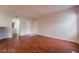 Spacious living area featuring wood flooring, neutral paint, and seamless flow at 5415 W Harmon Ave # 1162, Las Vegas, NV 89103