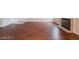 View of a living space with wood flooring, neutral walls, and a modern fireplace at 5415 W Harmon Ave # 1162, Las Vegas, NV 89103