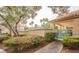 Community pool area with lush landscaping, secure fencing, and a covered area at 5415 W Harmon Ave # 1162, Las Vegas, NV 89103