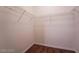 A walk-in closet with laminate floors and wire shelving at 5415 W Harmon Ave # 1162, Las Vegas, NV 89103