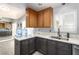 Charming kitchen featuring white countertops, and plenty of cabinet space for a functional cooking area at 5424 Geneive Ln # 105, Las Vegas, NV 89108