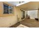 Back patio featuring a window and sliding glass door at 5424 Geneive Ln # 105, Las Vegas, NV 89108