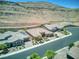 Aerial view of desert homes showcasing tile roofs and desert landscaping at 6315 Carol Butte Ct, Las Vegas, NV 89141