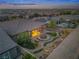 Aerial view showcases backyard oasis, covered patio, and stunning desert landscape at 6315 Carol Butte Ct, Las Vegas, NV 89141