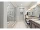 Bathroom featuring double sinks, lots of natural light, and a walk-in shower at 6315 Carol Butte Ct, Las Vegas, NV 89141