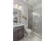 Updated bathroom featuring a glass shower and modern vanity at 6315 Carol Butte Ct, Las Vegas, NV 89141