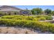 Highland Hills community entrance with lush landscaping and stone signage at 6315 Carol Butte Ct, Las Vegas, NV 89141