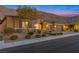 Charming single-story home featuring a tile roof, landscaped front yard, and a convenient three-car garage at 6315 Carol Butte Ct, Las Vegas, NV 89141