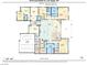 A floor plan showcasing the garage, kitchen, living room, bedrooms, and utility areas at 6315 Carol Butte Ct, Las Vegas, NV 89141