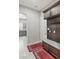 Mud room with a bench, cabinets, and access to the garage at 6315 Carol Butte Ct, Las Vegas, NV 89141