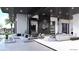 Open concept living room with deck access and contemporary design at 645 Dragon Peak Dr, Henderson, NV 89012