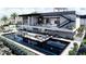 Modern two-story home featuring two outdoor pools, deck, and professionally landscaped grounds at 645 Dragon Peak Dr, Henderson, NV 89012