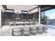 Modern kitchen with a large island and stylish seating at 645 Dragon Peak Dr, Henderson, NV 89012