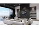 Bright modern living room with fireplace and expansive windows overlooking a terrace at 645 Dragon Peak Dr, Henderson, NV 89012