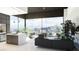 Modern living space featuring an open floor plan, view, island, and high-end appliances at 645 Dragon Peak Dr, Henderson, NV 89012