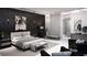 Stylish main bedroom with elegant furnishings, a statement wall, and modern décor at 645 Dragon Peak Dr, Henderson, NV 89012
