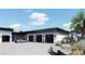 Pavered motorcourt featuring 4-car garage and modern design at 645 Dragon Peak Dr, Henderson, NV 89012