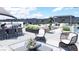 Rooftop deck with stylish seating, outdoor dining, and mountain views at 645 Dragon Peak Dr, Henderson, NV 89012